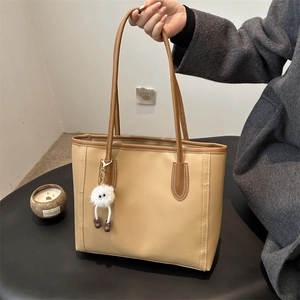 Minimalist large capacity tote bag in beige and brown with cute plush charm accessory