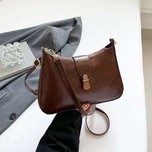 Retro dark brown leather underarm bag with gold lock and adjustable shoulder strap