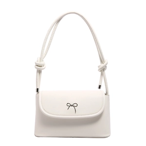 Minimalist white leather crossbody bag with silver bow buckle and knotted strap details