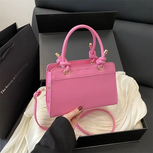 Pink large capacity shoulder tote bag with double knot handles and golden metal rings