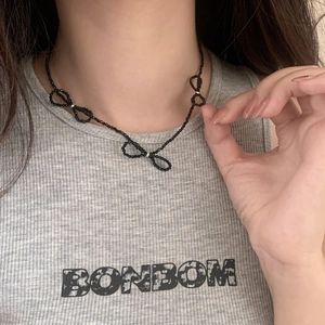 Handmade black beaded choker necklace featuring delicate bow knots for women's jewelry