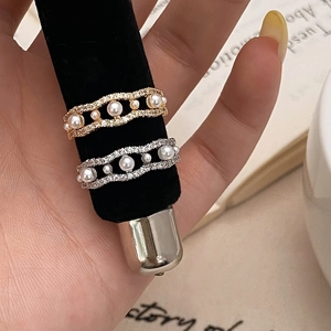 Elegant gold and silver wave rings with pearls and zircon stones for women
