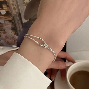 Elegant silver minimalist double-layer knot bracelet for women in a luxury daily style