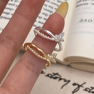 Elegant gold and silver double-layered butterfly rings with pearls and zircon stones