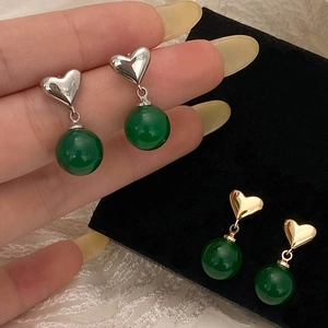 Elegant heart-shaped stud earrings with green chalcedony stone in gold and silver finish
