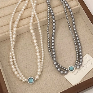 Collier élégant à double couche de perles avec pendentif en pierre bleue vintage