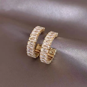 Chic gold C-shaped hoop earrings with pave rectangular cubic zirconia stones
