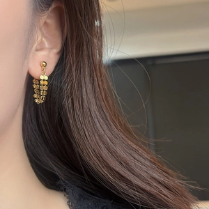 French vintage style golden chain tassel earrings with shimmering metallic sequins for women