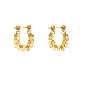 Detailed view of U-shaped gold tassel earrings with hexagonal honeycomb metal sequins