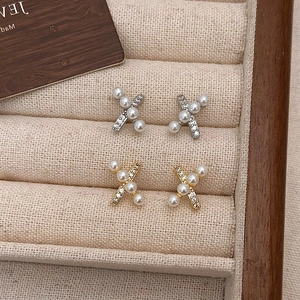 Elegant gold and silver cross earrings with micro-inlaid pearls and rhinestones design