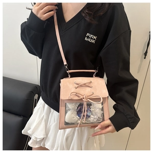 Pink PU leather ita bag with clear window and cross-lace detail for daily commute