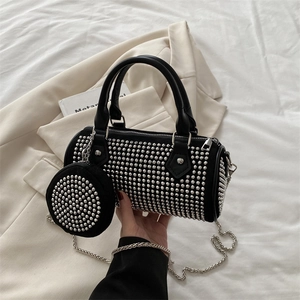Trendy black studded Boston handbag with mini pouch and silver chain strap for women