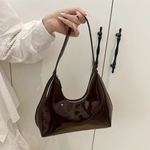 Chic dark coffee patent leather crescent shoulder bag with metallic zipper and logo