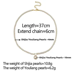 Detail of vintage pearl necklace featuring a 10mm pearl pendant and gold connector