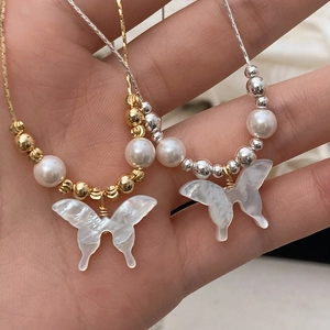 Minimalist butterfly shell pendant necklaces with pearls in gold and silver finish