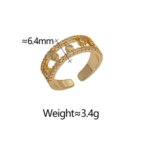Detail of gold hollow ring with sparkling cubic zirconia and dimensions data