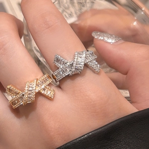 Bow knot ring set in gold and silver finish with sparkling cubic zirconia stones