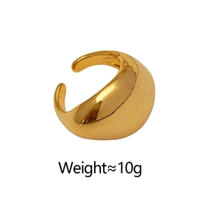 Detail shot of a minimalist gold teardrop ring showing polished finish and 10g weight tag