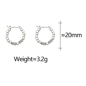 Close-up of silver beaded hoop earrings showing 20mm diameter size and 3.2g weight