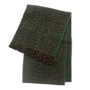 Close-up of dark green Donegal style knit scarf with colorful flecks and thick texture