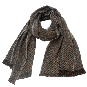 Detail of dark grey tweed scarf with colorful fiber specks and short fringe edges