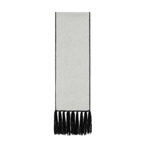 Detail of grey knitted scarf with black stitched edges and thick tassel fringe detailing