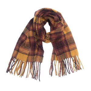 Detail view of ginger and burgundy plaid scarf featuring soft texture and fringe edges