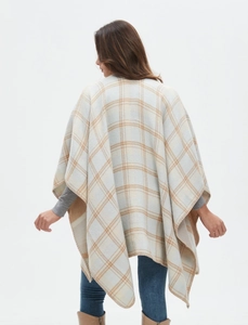 Back view of a classic blue and brown plaid cashmere-like cape with split hem for women
