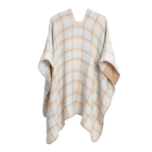 Detail view of the soft knit plaid shawl featuring beige and brown checkered pattern