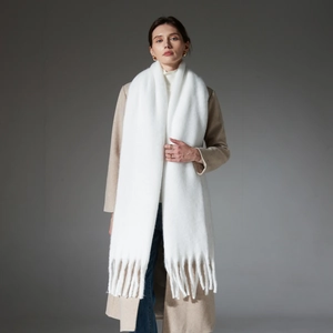 Minimalist white knit long scarf with tassel trim featuring cozy mohair texture