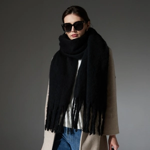 Thick black faux mohair scarf with chunky fringe tassels for winter warmth