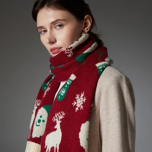 Red Christmas knitted scarf with white reindeer, snowmen and snowflakes patterns