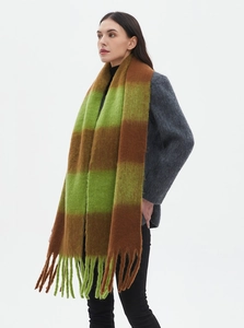 Thick winter scarf featuring bold green and brown stripes with soft textured fringe detail