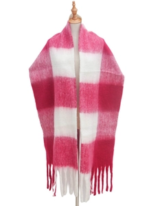 Close-up of pink and white checkered scarf featuring soft faux mohair and fringe tassels