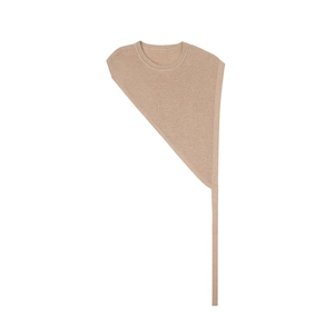 Close-up of beige knitted shawl with asymmetrical cut and decorative hanging ribbon
