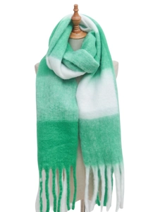 Detail of green and white color block scarf with long thick fringe and fuzzy texture