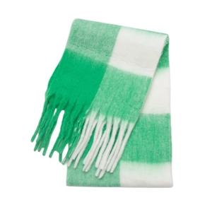 Close-up of green and white oversized checkerboard scarf with soft fringed tassel edges