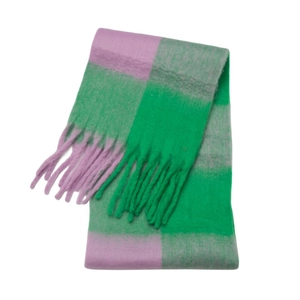 Close-up of green and purple plaid scarf featuring thick yarn texture and fringe tassels