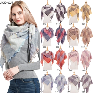 Detail showing eight checkered scarf color options with classic fringe and knit texture