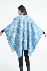 Detailed back view of a blue paisley wool shawl with exquisite white embroidery patterns