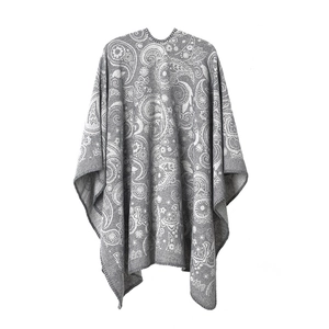 Detailed texture of grey paisley wool blend shawl showing intricate white jacquard patterns
