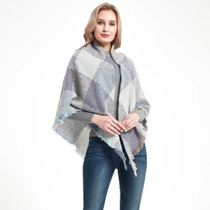 Plaid oversized shawl scarf in grey and blue with soft fringe detail and color accents