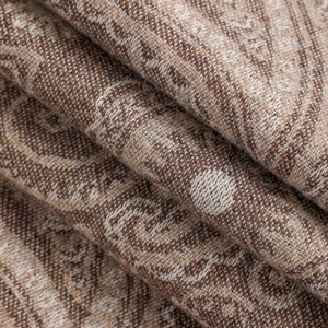 Detailed close-up of premium paisley pattern wool shawl with soft jacquard texture