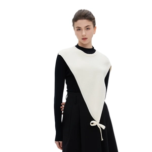 White knit shawl vest with triangle V-shape design and ribbon bow for women's layering