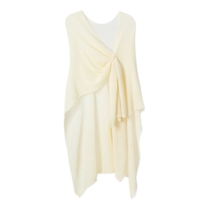 Close-up of ribbed knit texture and twist knot detail on cream women's shawl cardigan