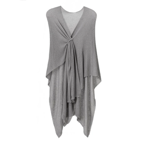 Detail of grey knitted shawl showing the twist-knot front and elegant draped texture