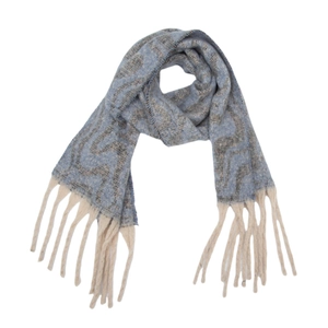Close-up of blue and grey wavy jacquard knit scarf featuring long cream tassel fringe