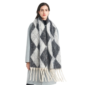 Autumn winter argyle knit scarf with fringes shown on a model in gray coat