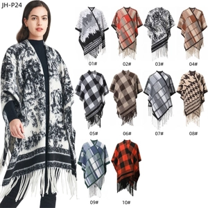 Detail view of ink painting shawl wrap and various jacquard tassel poncho patterns