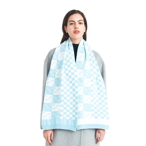 Blue and white checkerboard knit scarf for winter with stylish textured striped patterns